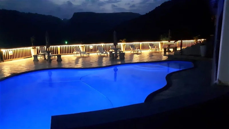 Umtamvuna View Cabanas: NIght View of the pool